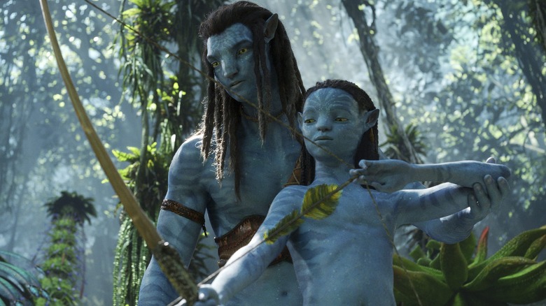 Jake and his child in Avatar: The Way of Water
