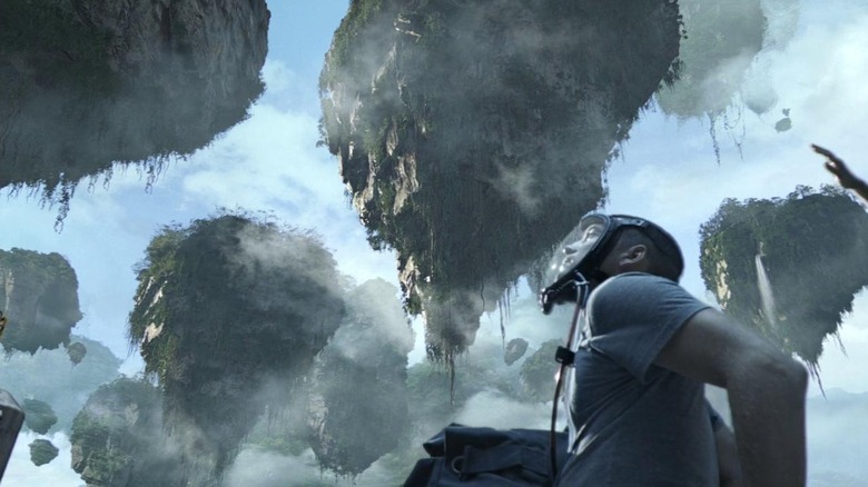 Man stares at floating mountains