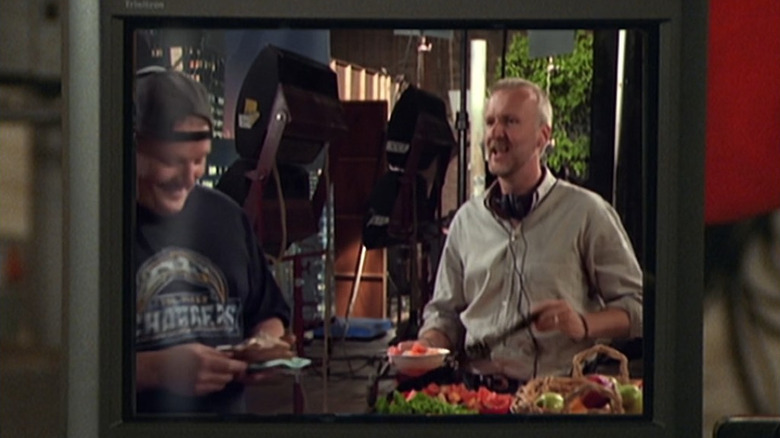 James Cameron yelling at a crew guy at the catering table on a vdeo monitor on Mad About You