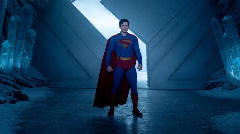 Superman stands in the front entrance of the Fortress of Solitude in Superman