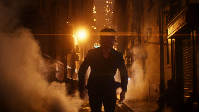 Tom Rhys Harries as Matt Hagan running down an alleyway in Clayface