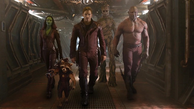 Galaxy guards walk in an alley