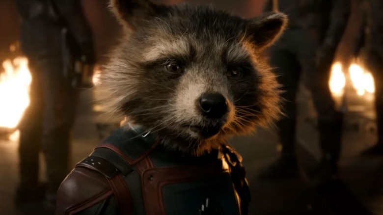 Rocket Raccoon in Guardians of the Galaxy Vol. 3 surrounded by fire