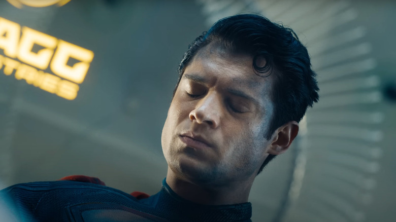 David Corenswet as Kal-El looks up in Superman