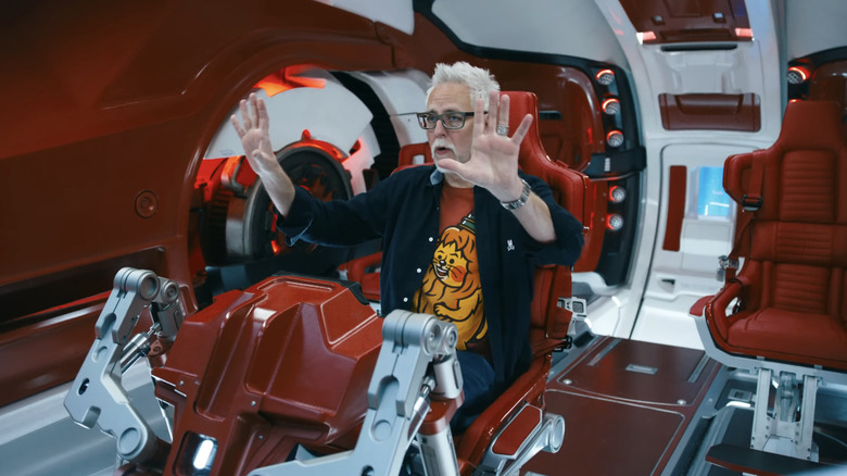 James Gunn directing in the cockpit of Mister Terrific's T-Ship in Superman