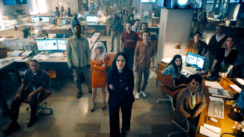 Lois leads the Daily Planet team in Superman