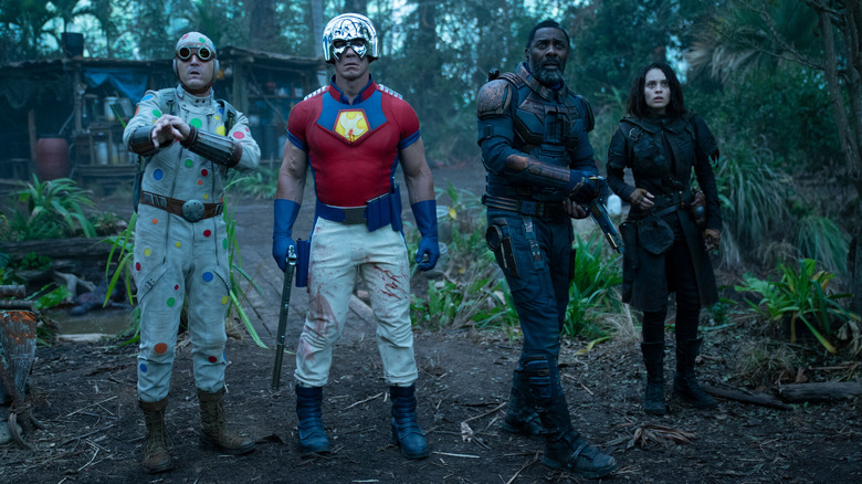 Polka-Dot Man, Peacemaker, Bloodsport, and Ratcatcher 2 standing together in The Suicide Squad