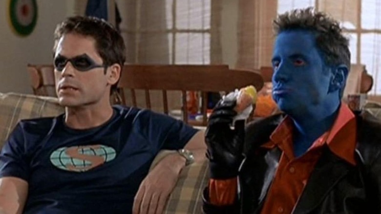 The Weevil and Amok, sitting on a souch at home. A scene from The Specials.