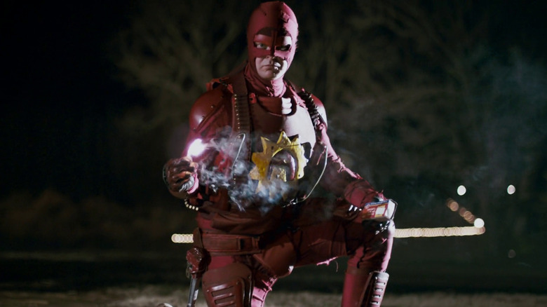 Rainn Wilson as the Crimson Bolt in action