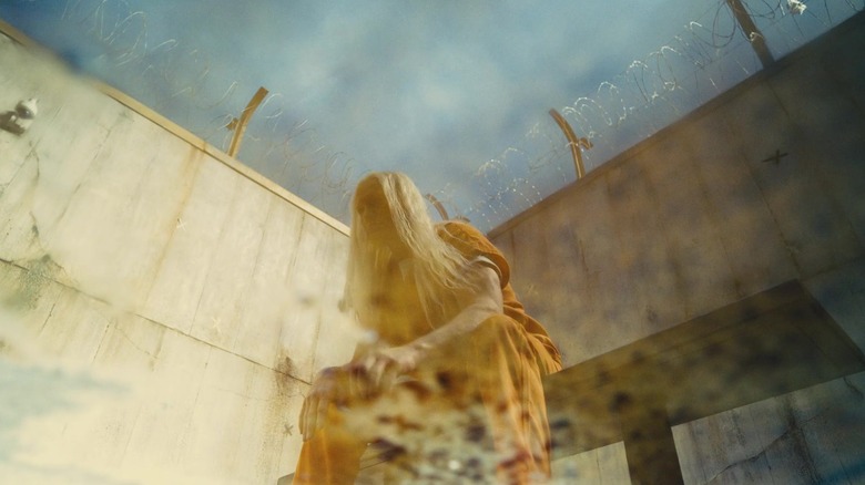 Savant being reflected in a puddle in The Suicide Squad