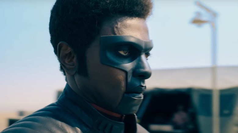 Mr. Terrific looking to the side