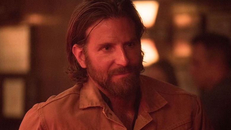 Bradley Cooper as Jackson Maine wearing a jacket in A Star is Born (2018)
