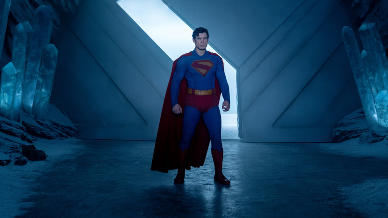 Superman standing in front of the Fortress of Solitude door in Superman