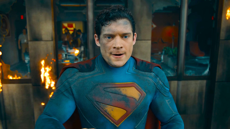 Superman in a charred outfit in Superman (2025)