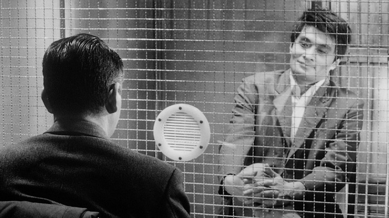 Kingo Gondo (Toshiro Mifune) confronts Ginjirō Takeuchi (Tsutomu Yamazaki) in a holding cell in High and Low (1963)