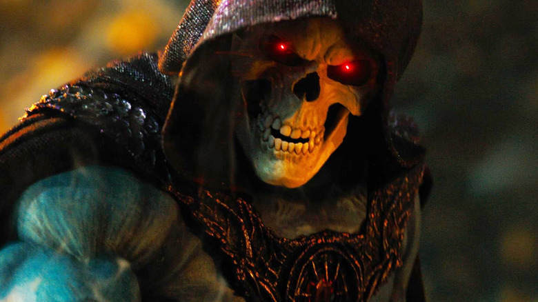 Jared Leto as Skeletor with glowing red eyes wearing a hood in Masters of the Universe (2026)