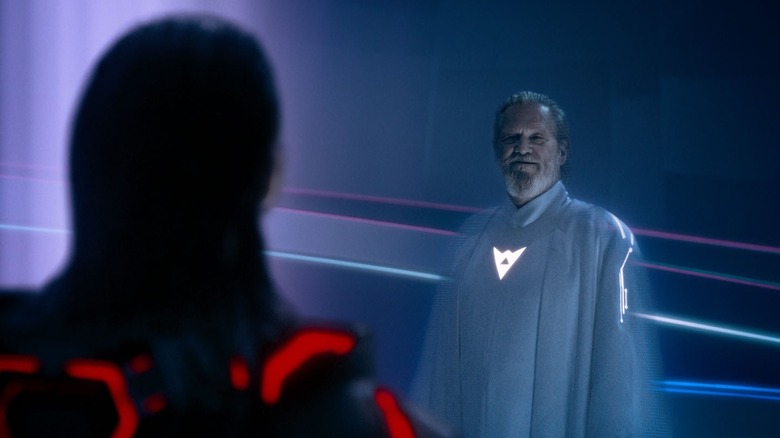 Jeff Bridges as Flynn looking at Jared Leto as Ares in Tron: Ares