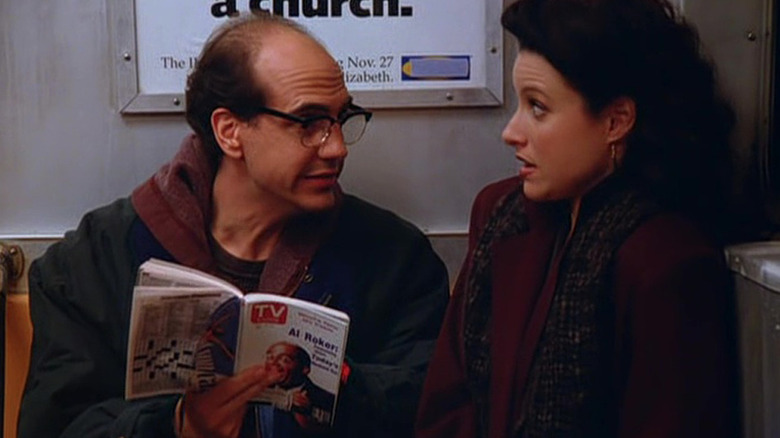 Ricky reading a TV Guide to Elaine on a subway on Seinfeld