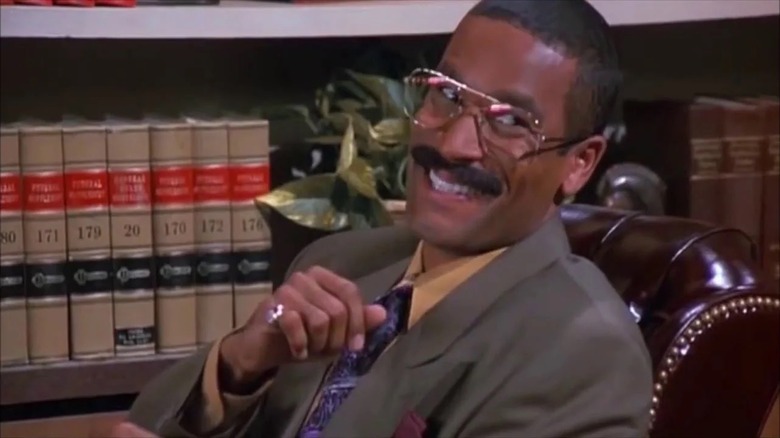 Phil Morris flashes a scheming grin as Jackie Chiles in Seinfeld