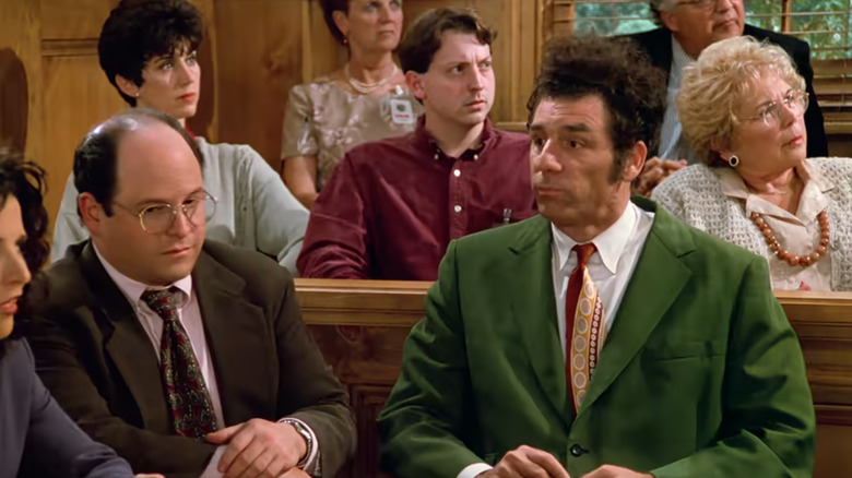 Jason Alexander like George and Michael Richards like Kramer, with Alexander's wife, Daena, the title behind him as a juror in Seinfeld