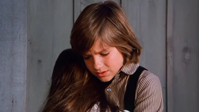 Jason Bateman as James Cooper hugging his sister in Little House on the Prairie