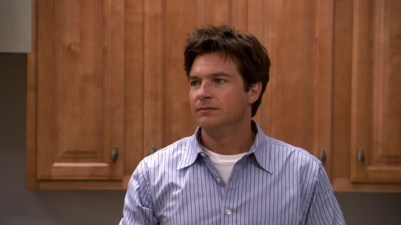 Jason Bateman as Michael Bluth standing in a kitchen in Arrested Development