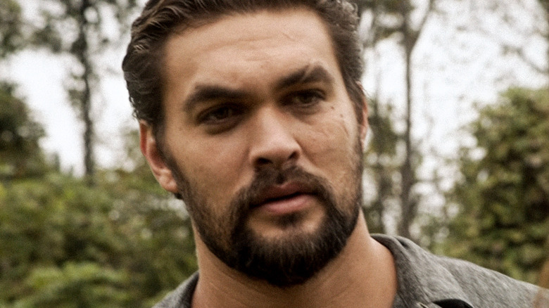 Jason Momoa's Phillip Kopus stands outside in The Red Road