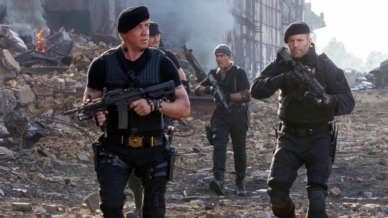 Barney, Lee, and other Expendables in full soldier gear in Expend4bles.
