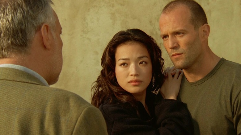Jason Statham as Frank with Shu Qi as Lai in The Transporter