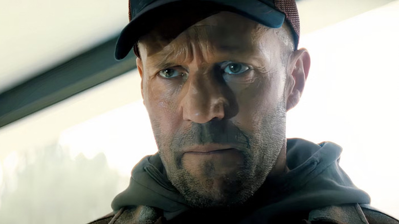 Levon Cade gives a gangster the stare of death in A Working Man