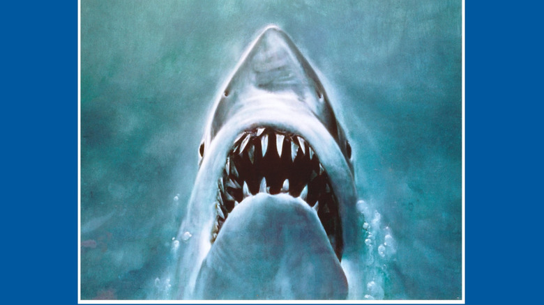 The shark coming up from the water on the poster for Jaws