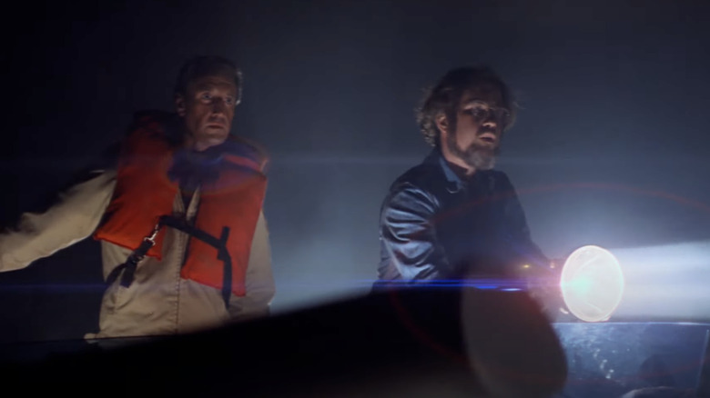 Brody and Hooper out on a boat at night in Jaws
