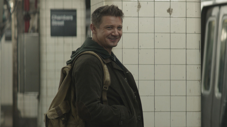 Clint Barton smiling in the subway station on Hawkeye