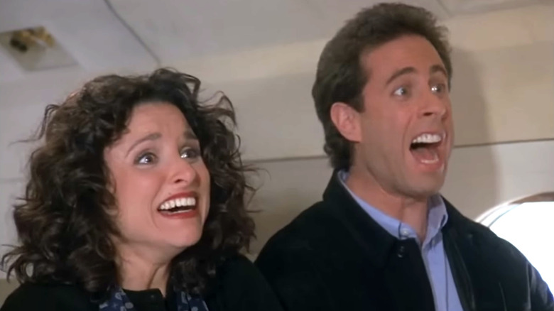Seinfeld, Elaine and Jerry celebrating that their plane isn't going to crashSeinfeld, Elaine looking mischievous on Jerry's couch