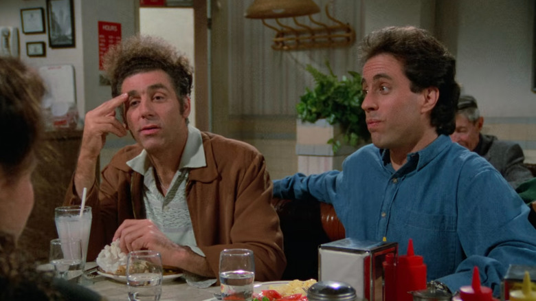 Kramer and Jerry sitting in Tom's Restaurant in Seinfeld