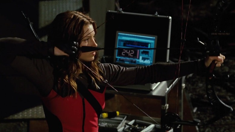 Jessica Biel as Abigail Whistler practicing firing arrows in Blade: Trinity