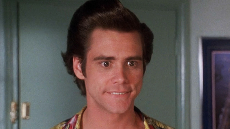 Ace Ventura's Jim Carrey is seen via the frame in ACE Ventura Pet Detective