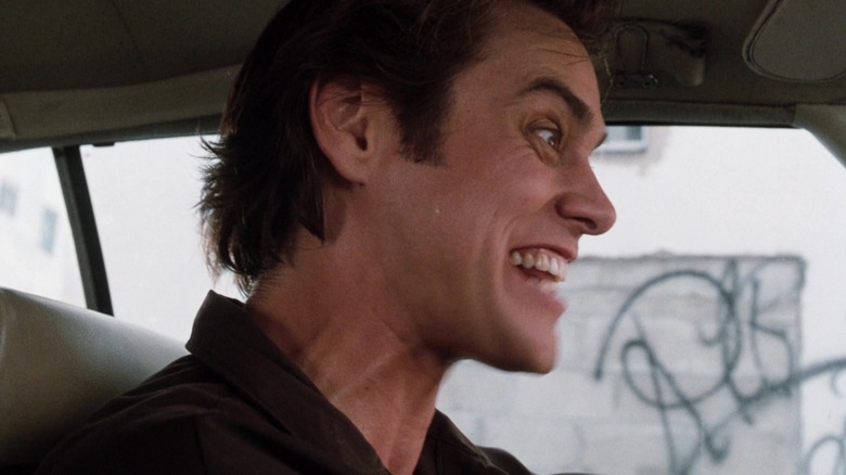 It seems that Jim Curry in Venta looks excited because he sits in a car in ACE Ventura Pet Detective