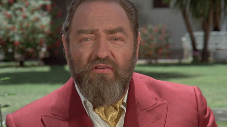 Sebastian Cabot's Winston Essex is seen in closeup as he stands outside in Ghost Story