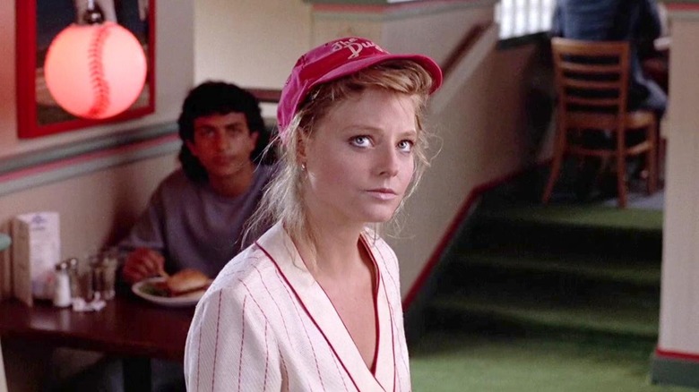 Jodie Foster as Sarah Tobias wearing a baseball cap in The Accused