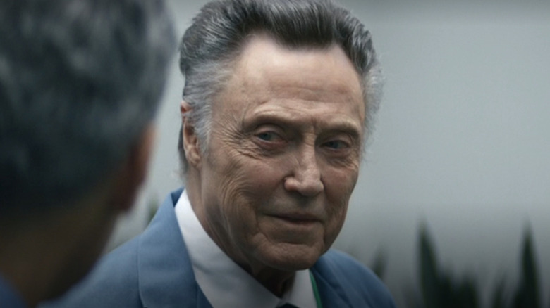 Christopher Walken as Burt Goodman smiling at Irving in Severence