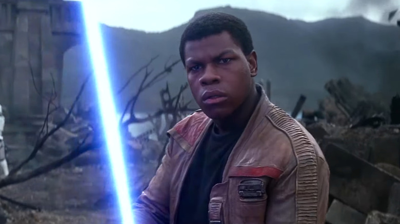 Star Wars: The Force Awakens, Finn wields a lightsaber for the first time