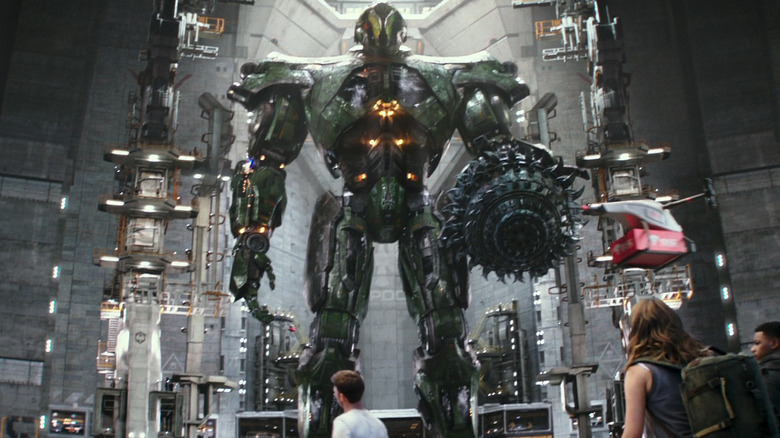 A giant Jaeger is seen from a low angle in a hanger in Pacific Rim Uprising