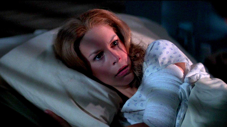 Laurie lies in her hospital bed