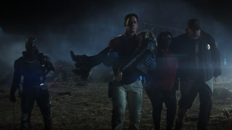 Peacemaker and his team after defeating the Butterflies