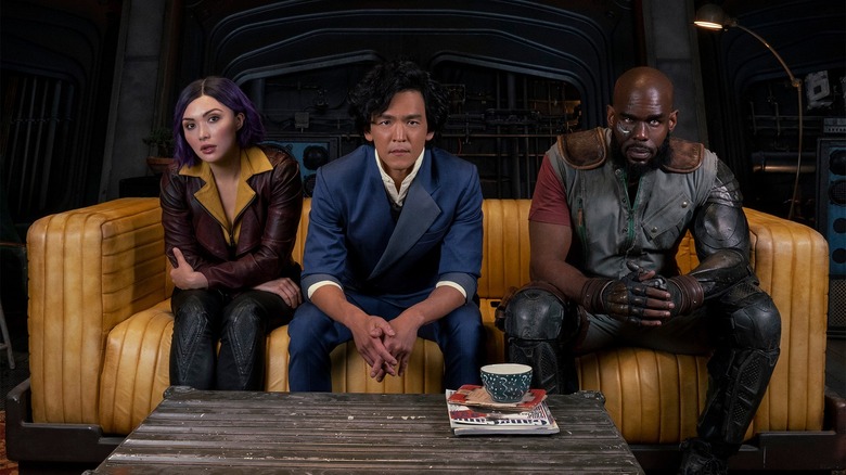 Daniella Pineda, John Cho, and Mustafa Shakir star in the live action Netflix adaptation of Cowboy Bebop (2021)