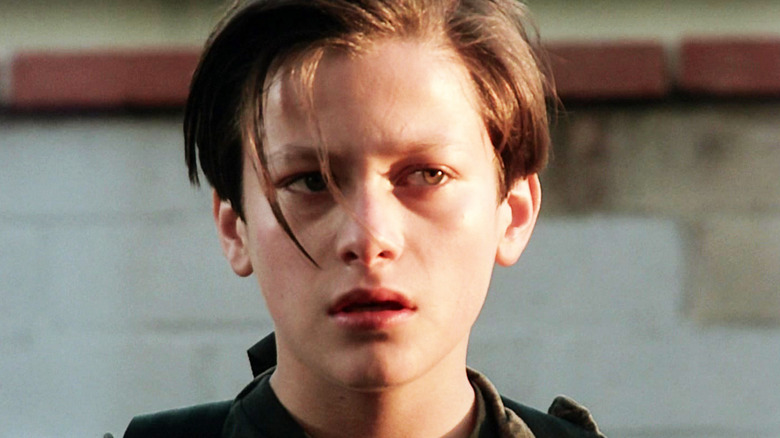 Edward Furlong's John Connor looks off to his left in Terminator 2