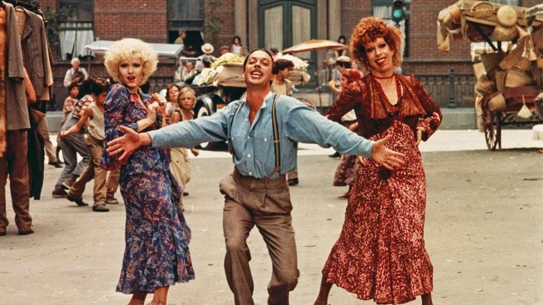 Bernadette Peters, Tim Curry, and Carol Burnett singing Easy Street
