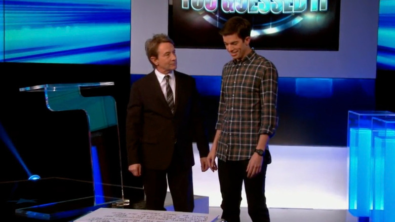 Lou Cannon and John Mulaney on a game show set in Mulaney