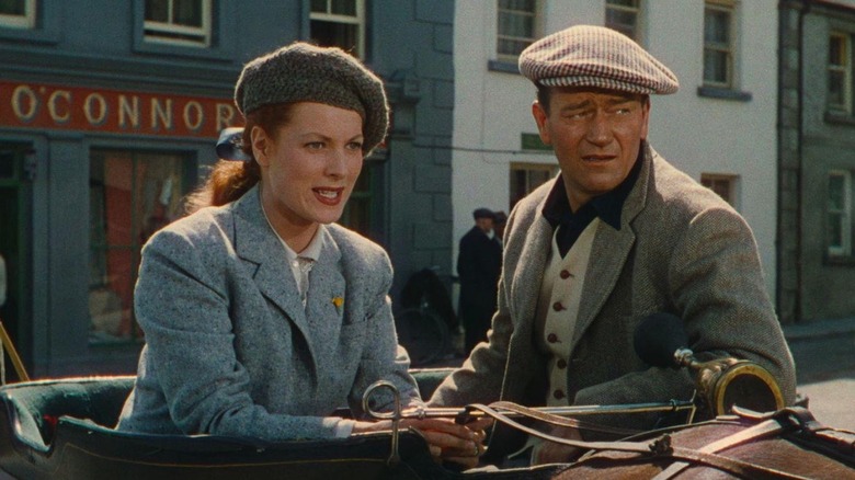 Mourin Uhara in the role of Marie Kate Danhir and John Wayne in the role of Sean Thornton in a calm man